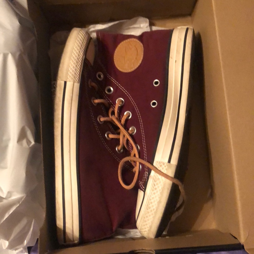 maroon suede hightop converse.